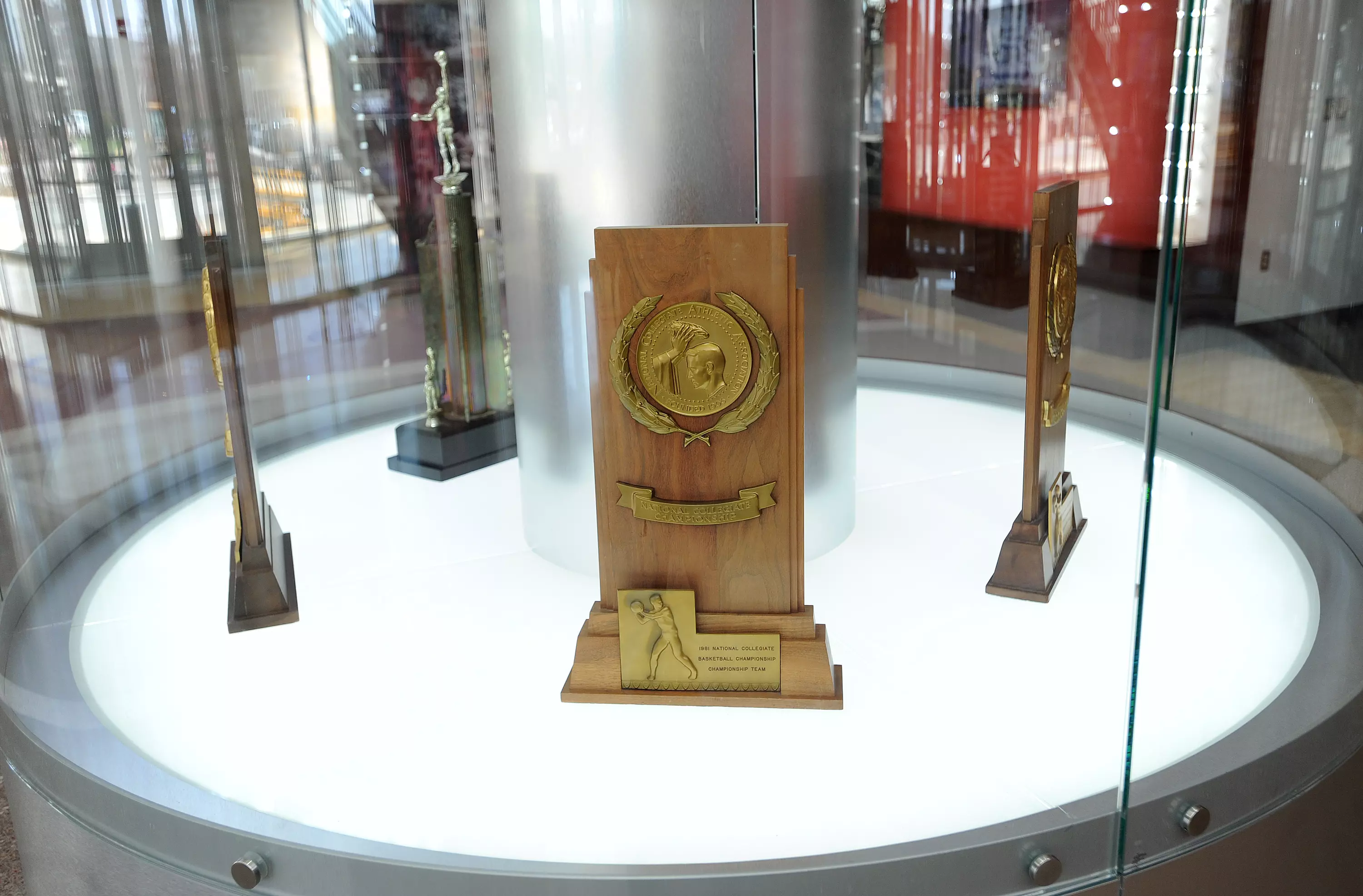 Cook Hall Legacy Court Tower which contains the five Men's Basketball National Championship Trophies.