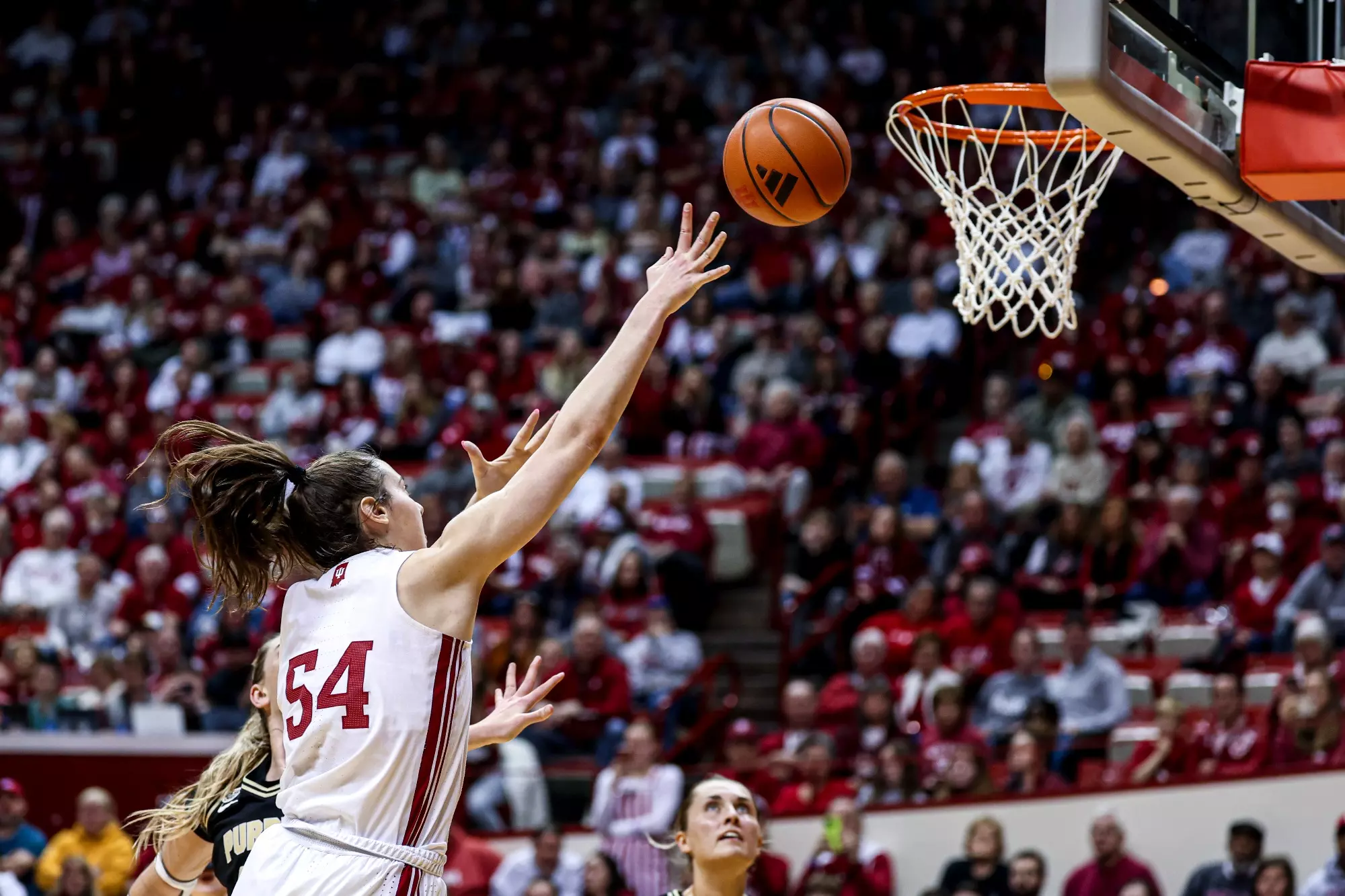 BLOOMINGTON, IN - February 11, 2024 - forward Mackenzie Holmes #54 of the Indiana Hoosiers during the game between the Purdue Boilermakers and the Indiana Hoosiers at Simon Skjodt Assembly Hall in Bloomington, IN. Photo By Andrew Mascharka/Indiana Athletics