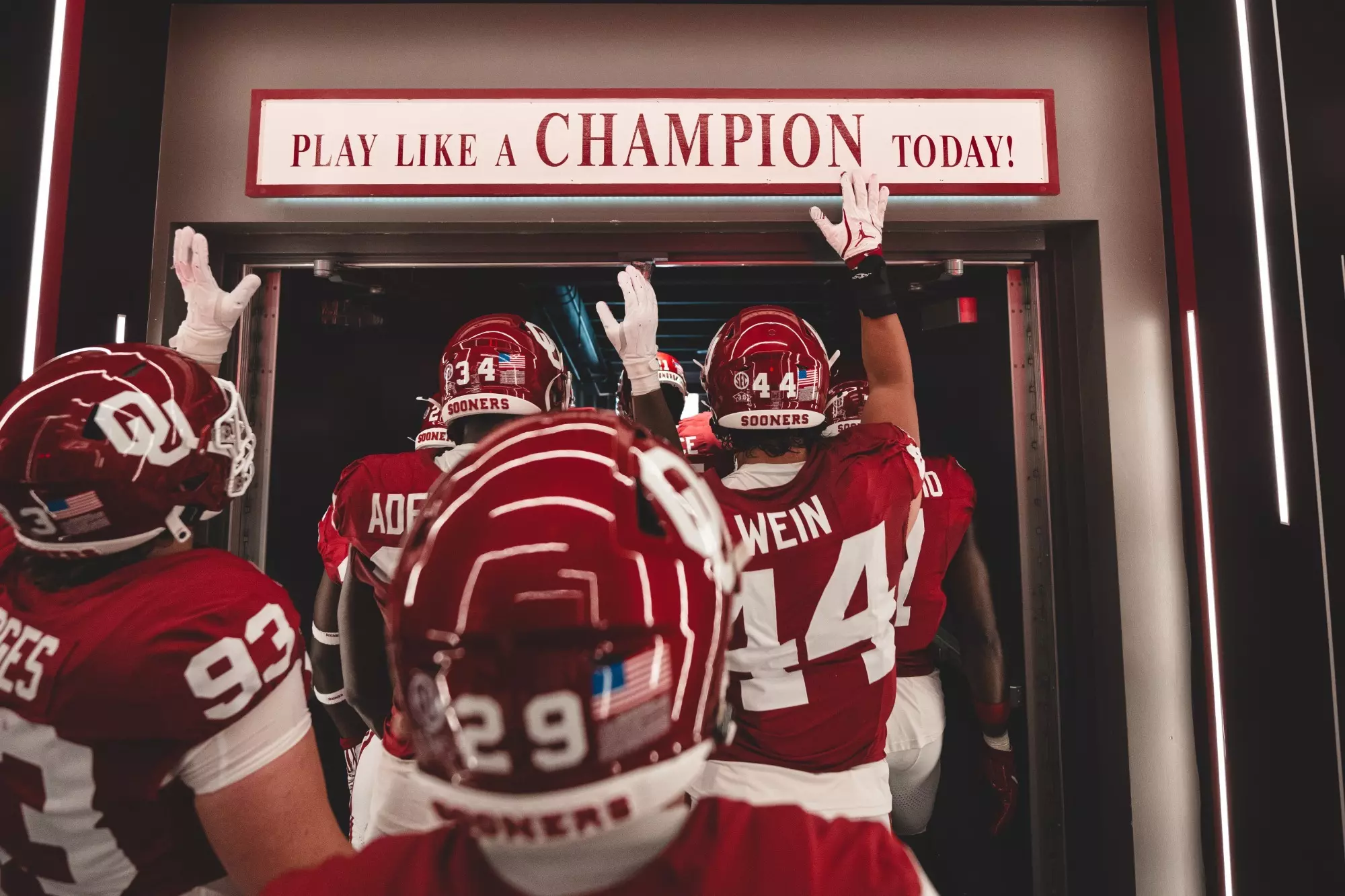 NORMAN, OK - August 30, 2025 - Oklahoma Football Team hits the “Play Like a Champion Today!” sign during the game between the Illinois State Redbirds and the Oklahoma Sooners at Gaylord Family - Oklahoma Memorial Stadium in Norman, OK. Photo By Morgan Givens/University of Oklahoma