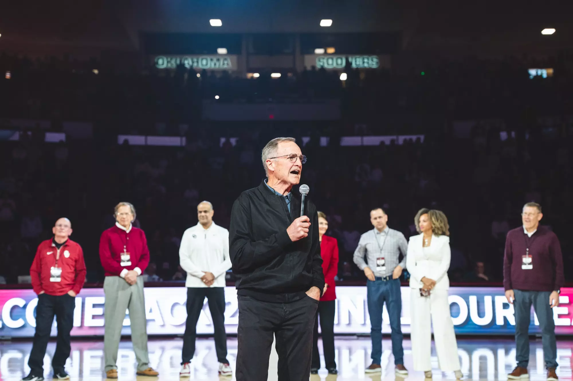 Former Men's Basketball Head Coach Lon Kruger talks to the crowd during the men's basketball 2016 Final Four reunion recognition.