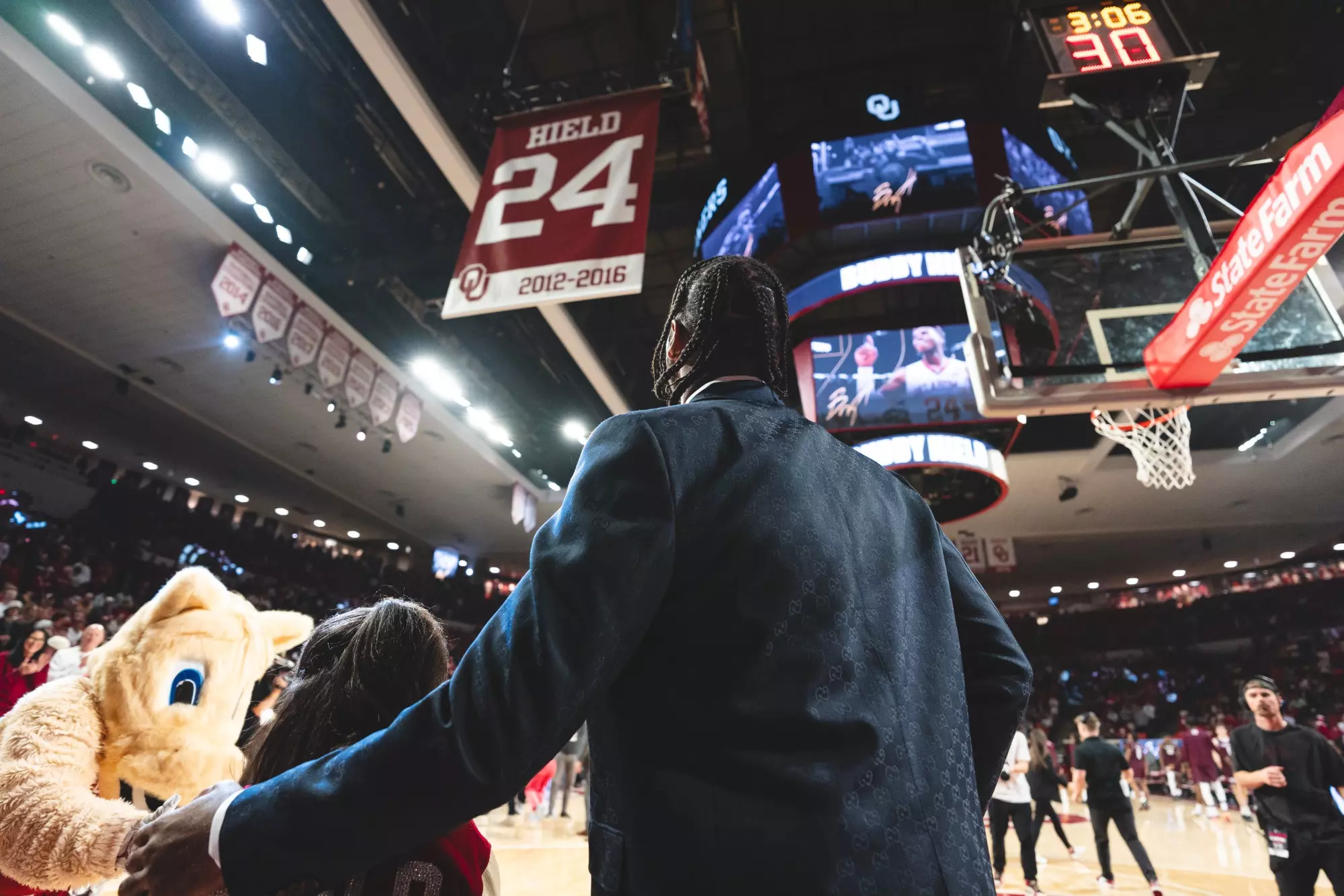 Buddy Hield looking at his jersey banner