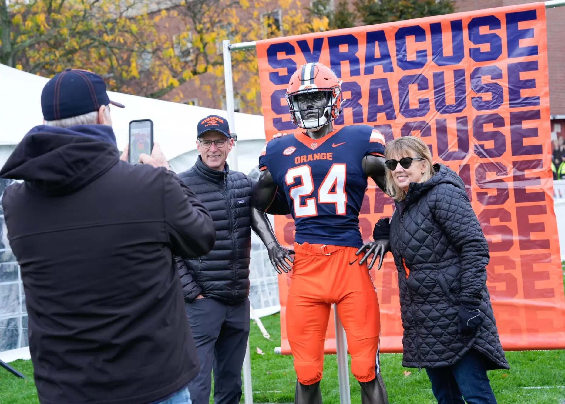 Fans having their photo taken at the 'Cuse Uniform Showcase
