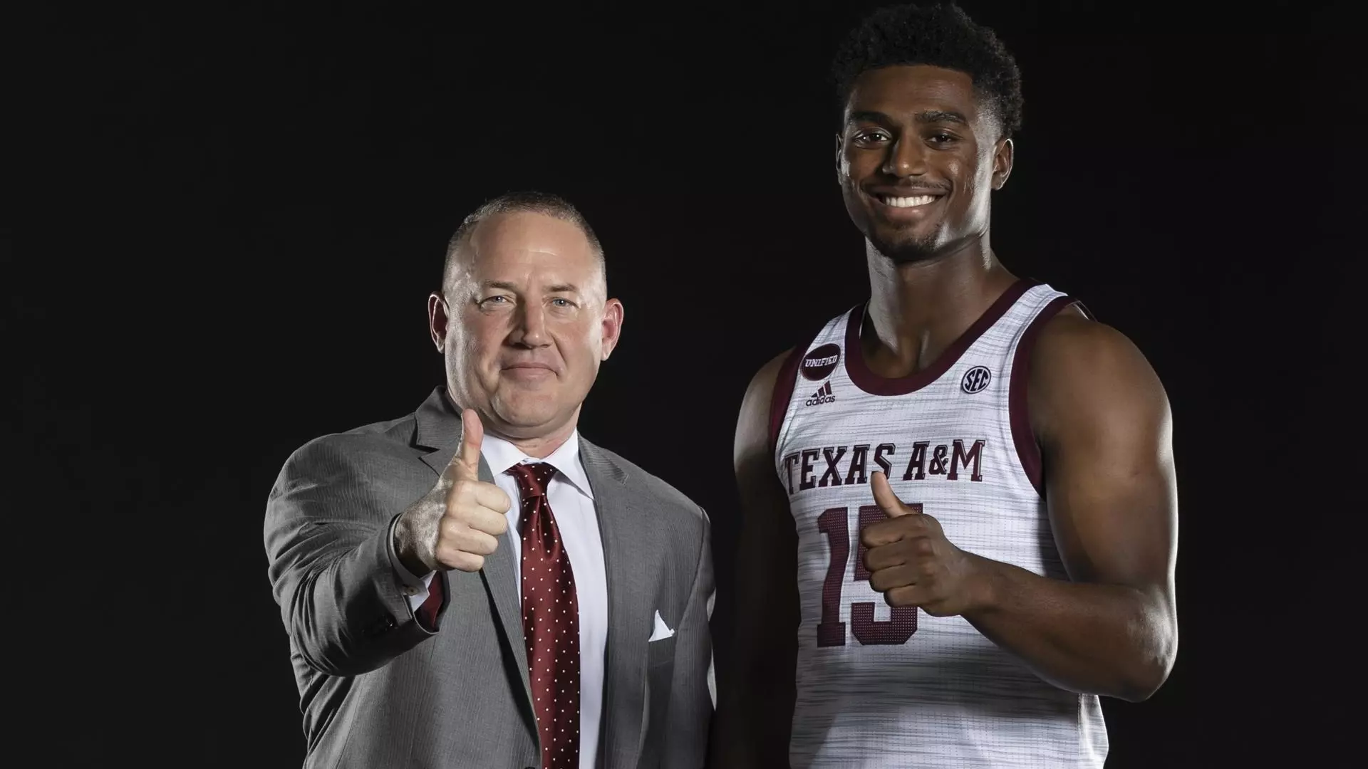 COLLEGE STATION, TX - October 29, 2021 - Forward Henry Coleman III #15 of the Texas A&M Aggies and Head Coach Buzz Williams of the Texas A&M Aggies during Menís Basketball Suit Photo Day in College Station, TX. Photo By Craig Bisacre/Texas A&M Athletics