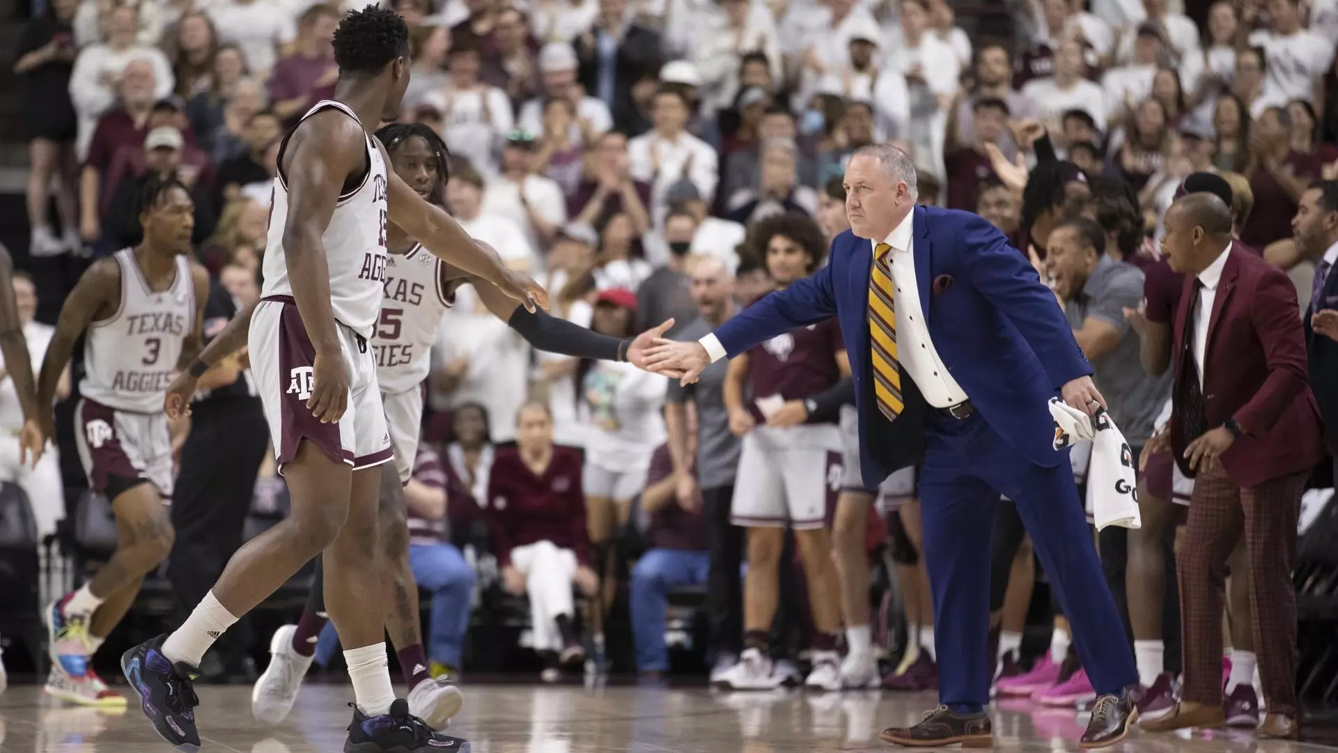 COLLEGE STATION, TX - March 23, 2022 - Head Coach Buzz Williams of the Texas A&M Aggies, Guard Manny Obaseki #35 of the Texas A&M Aggies, and Forward Henry Coleman III #15 of the Texas A&M Aggies during the NIT Tournament game between the Demon Deacons and the Texas A&M Aggies at Reed Arena in College Station, TX. Photo By Aiden Shertzer/Texas A&M Athletics