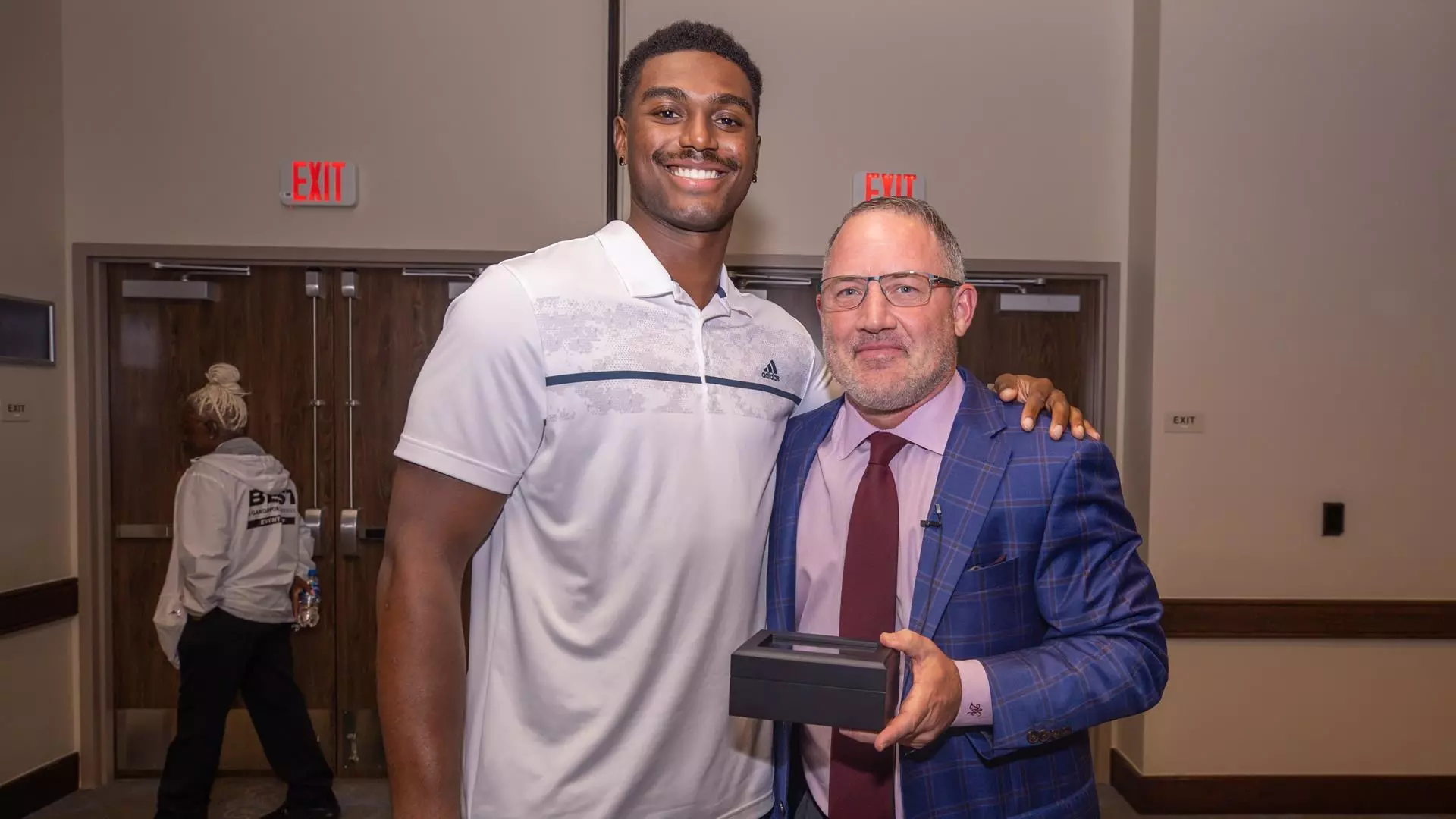 COLLEGE STATION, TX - October 21, 2022 - Forward Henry Coleman III #15 of the Texas A&M Aggies and Head Coach Buzz Williams of the Texas A&M Aggies during the Men?s Basketball Tip Off Banquet in College Station, TX. Photo By Evan Pilat/Texas A&M Athletics