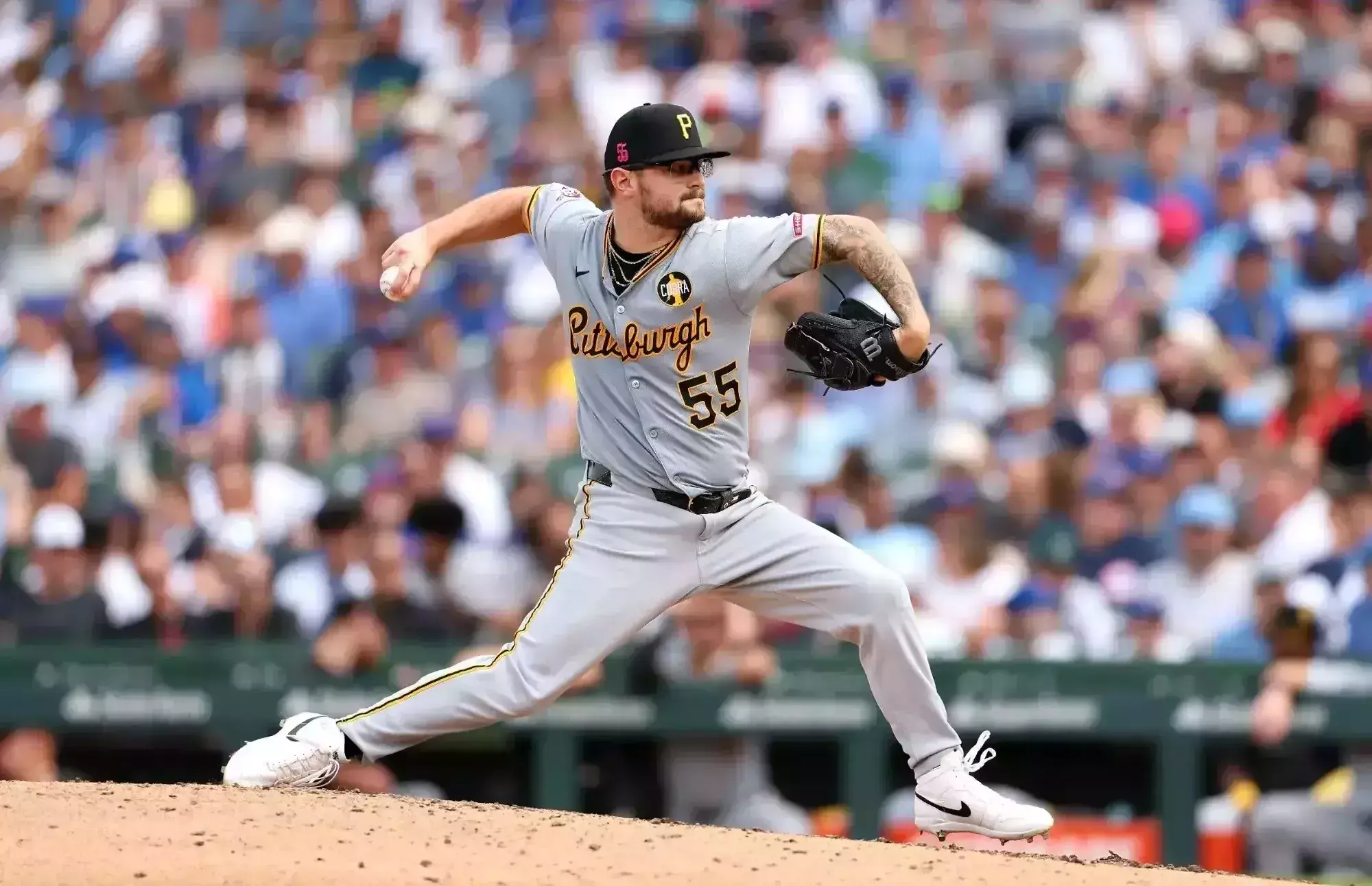 CHICAGO, ILLINOIS - AUGUST 17: Chase Shugart #55 of the Pittsburgh Pirates pitches against the Chicago Cubs during the seventh inning at Wrigley Field on August 17, 2025 in Chicago, Illinois. (Photo by Luke Hales/Getty Images)