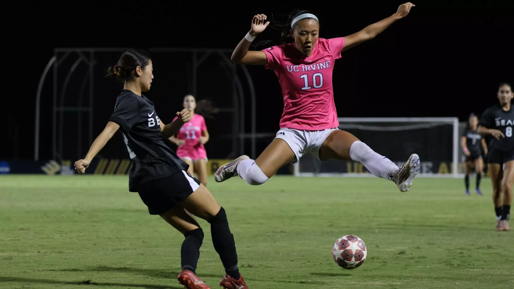 Fiona Shin leaps to avoid a pass in a 2026 match vs. Long Beach State