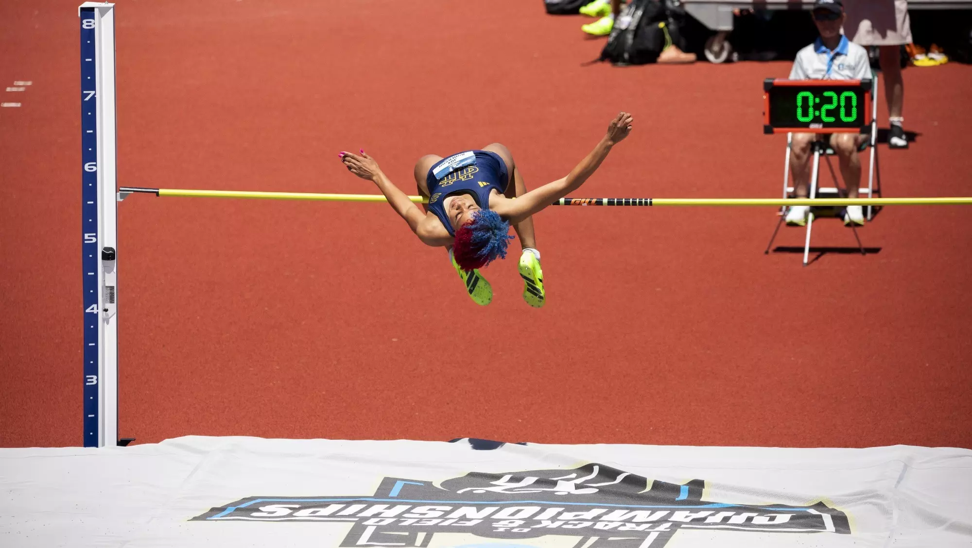 Joy Anderson goes over the high jump bar at the NCAA Championships at Hayward Field