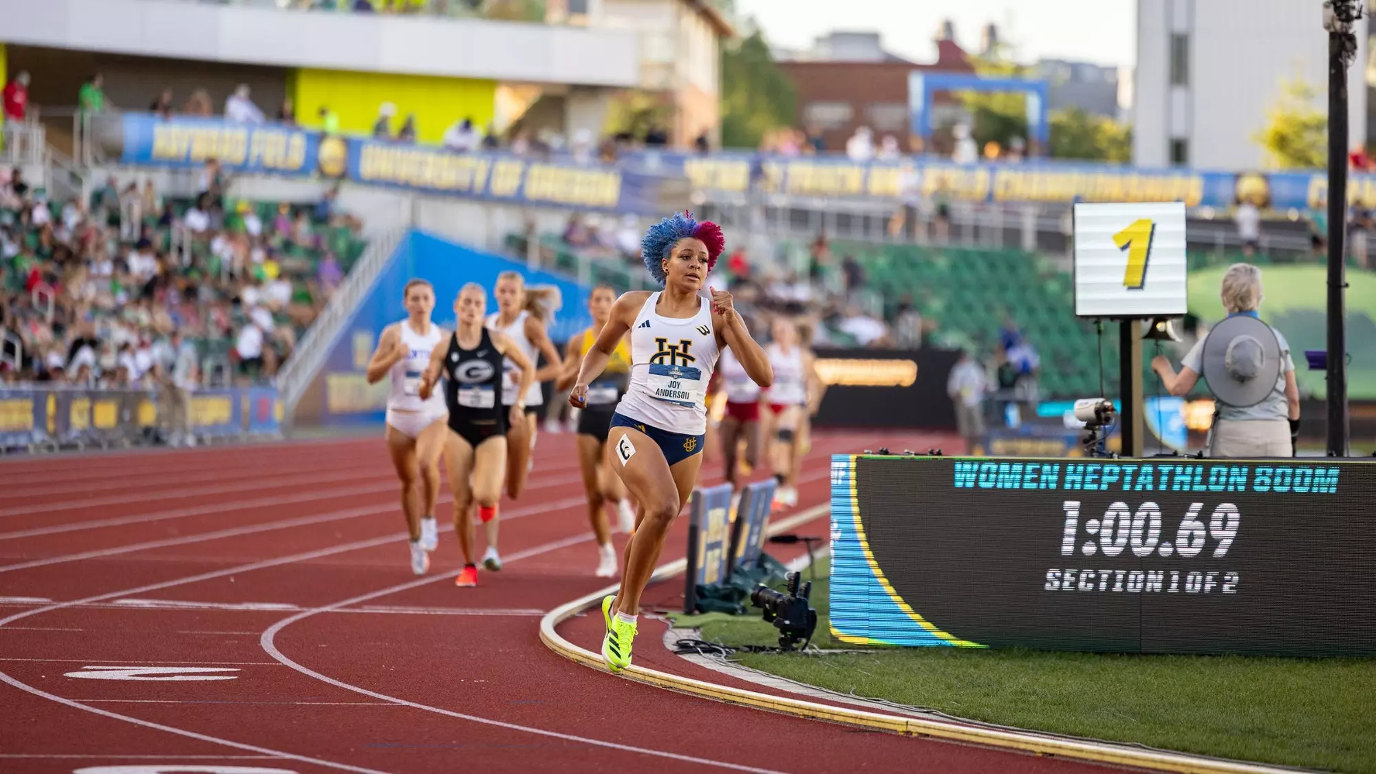 Joy Anderson running on the track at Hayward Field