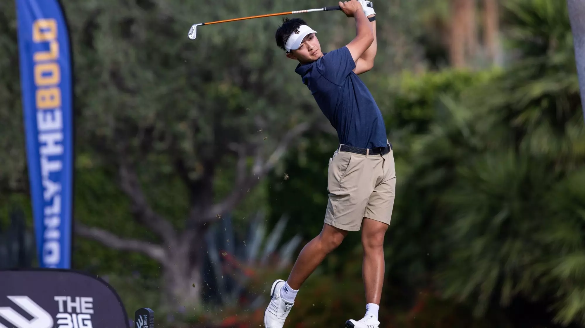 Jack Yu follows through on a tee shot at the Big West Championships.