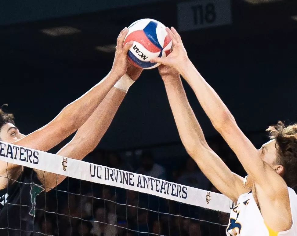 Cameron Kosty has a joust at the net