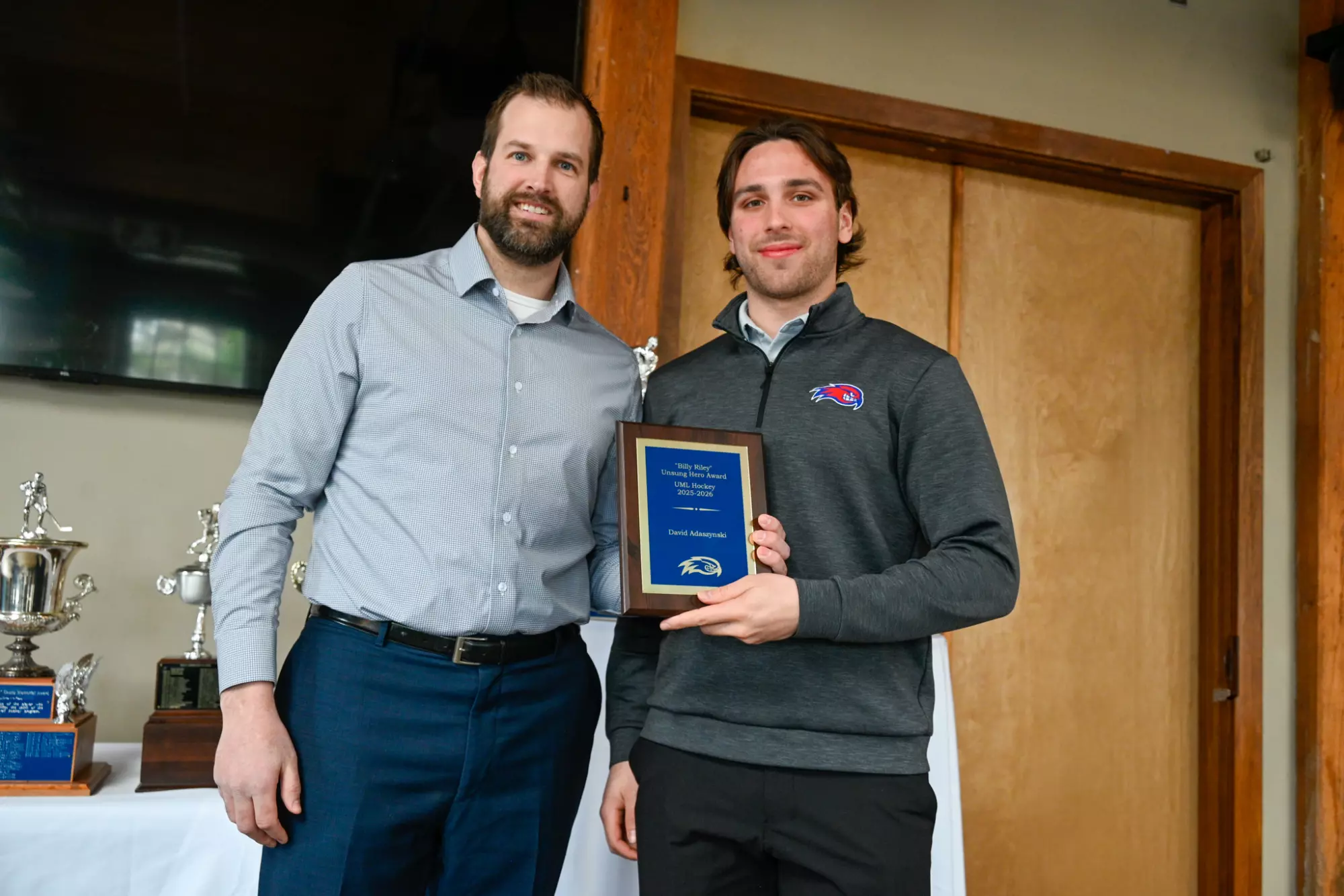 David Adaszynski Holding Billy Riley Award