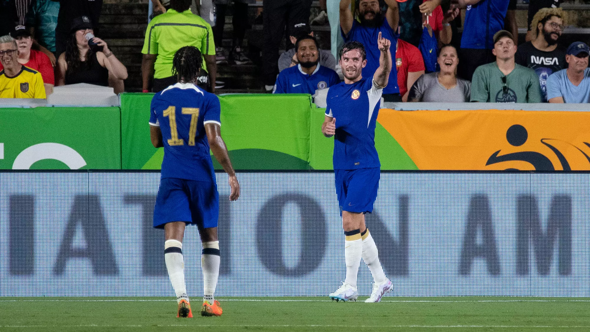 Chelsea players celebrate scoring a goal against Wrexham.