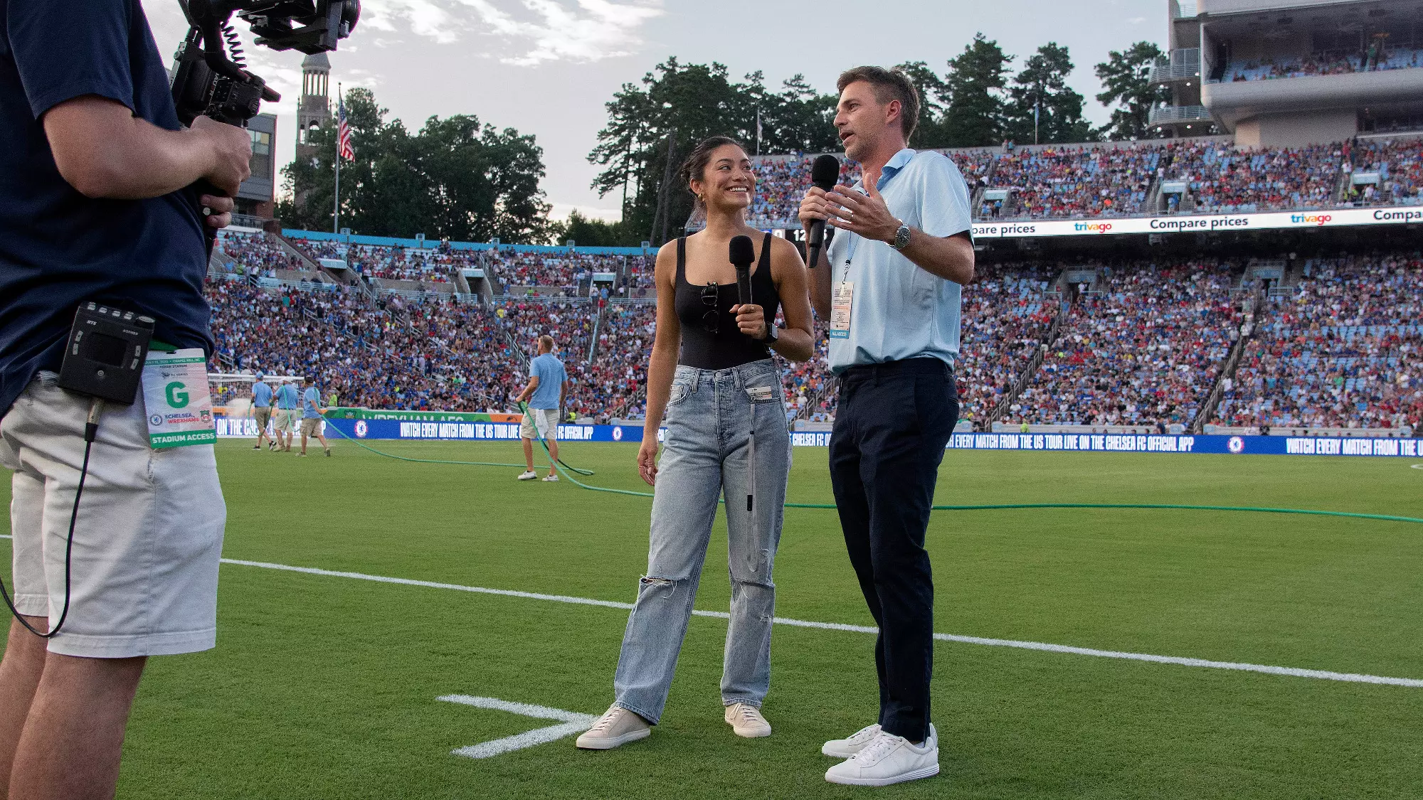 Jenny Chiu, a former UNC soccer player and current broadcast journalist, on the field prior to the Chelsea-Wrexham match.