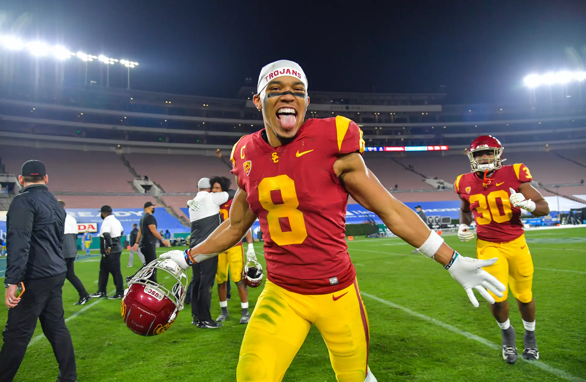 Amon-Ra St. Brown celebrates after beating UCLA