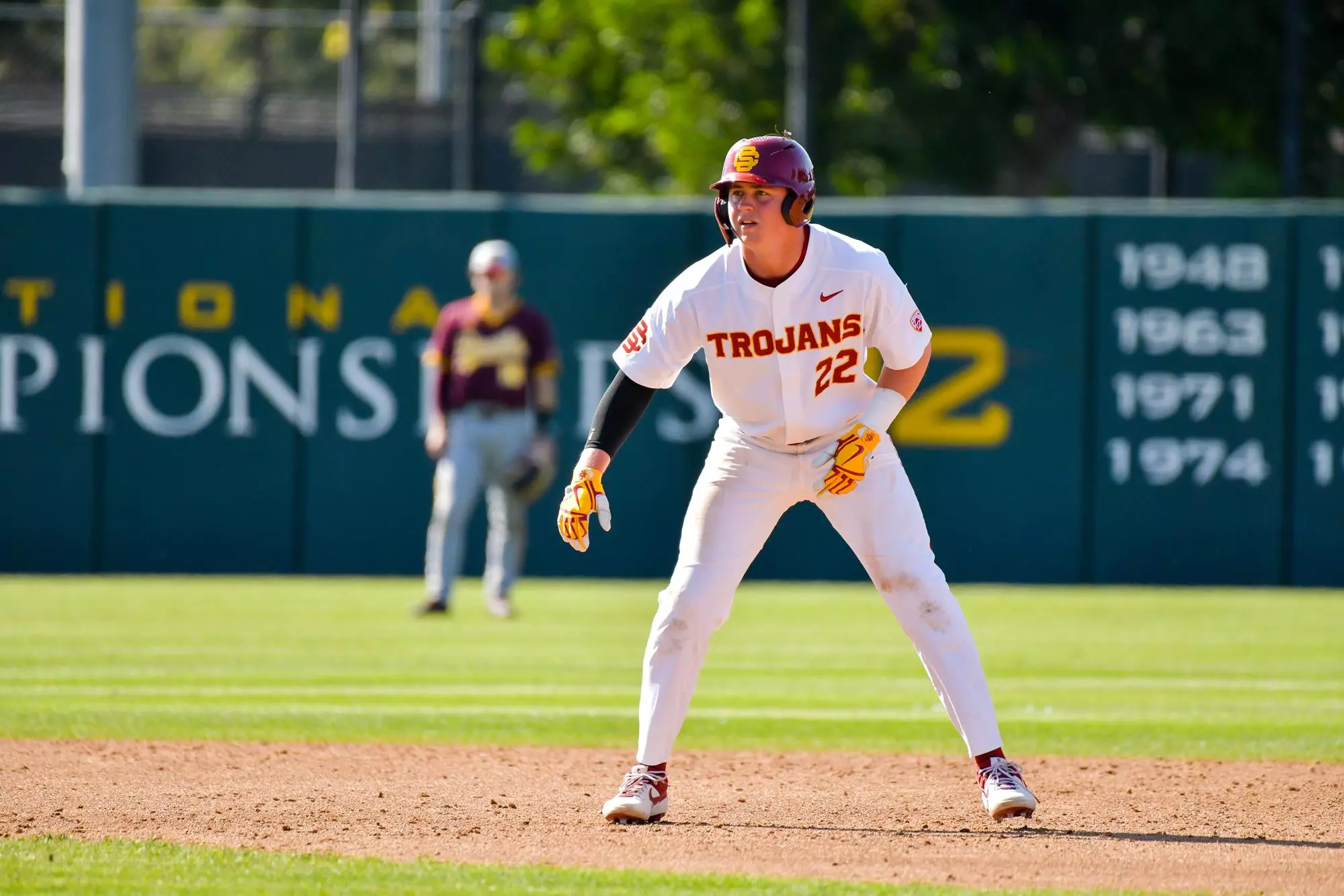 Clay Owens standing between first and second base