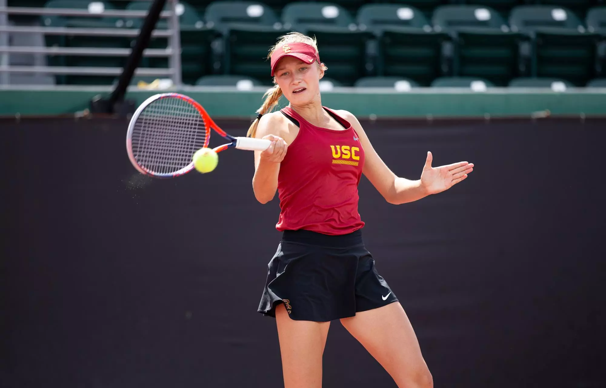 Danielle Willson hits forehand