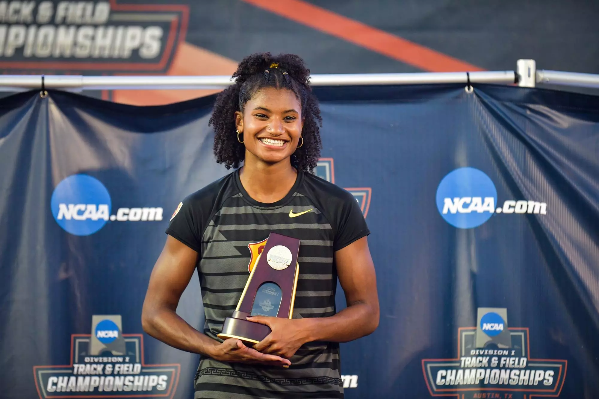 Anna Cockrell poses with trophy