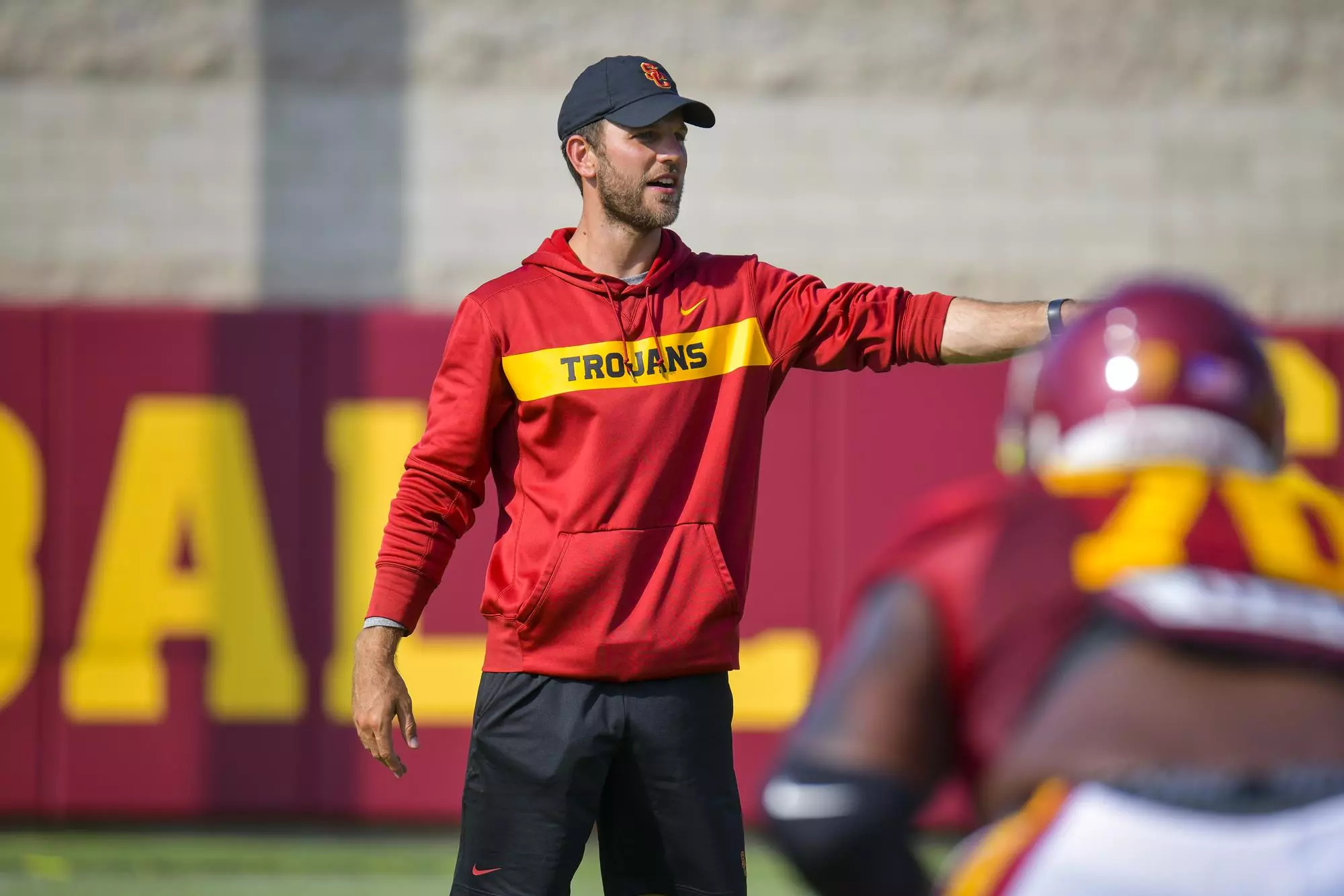 Graham Harrell coaching at practice