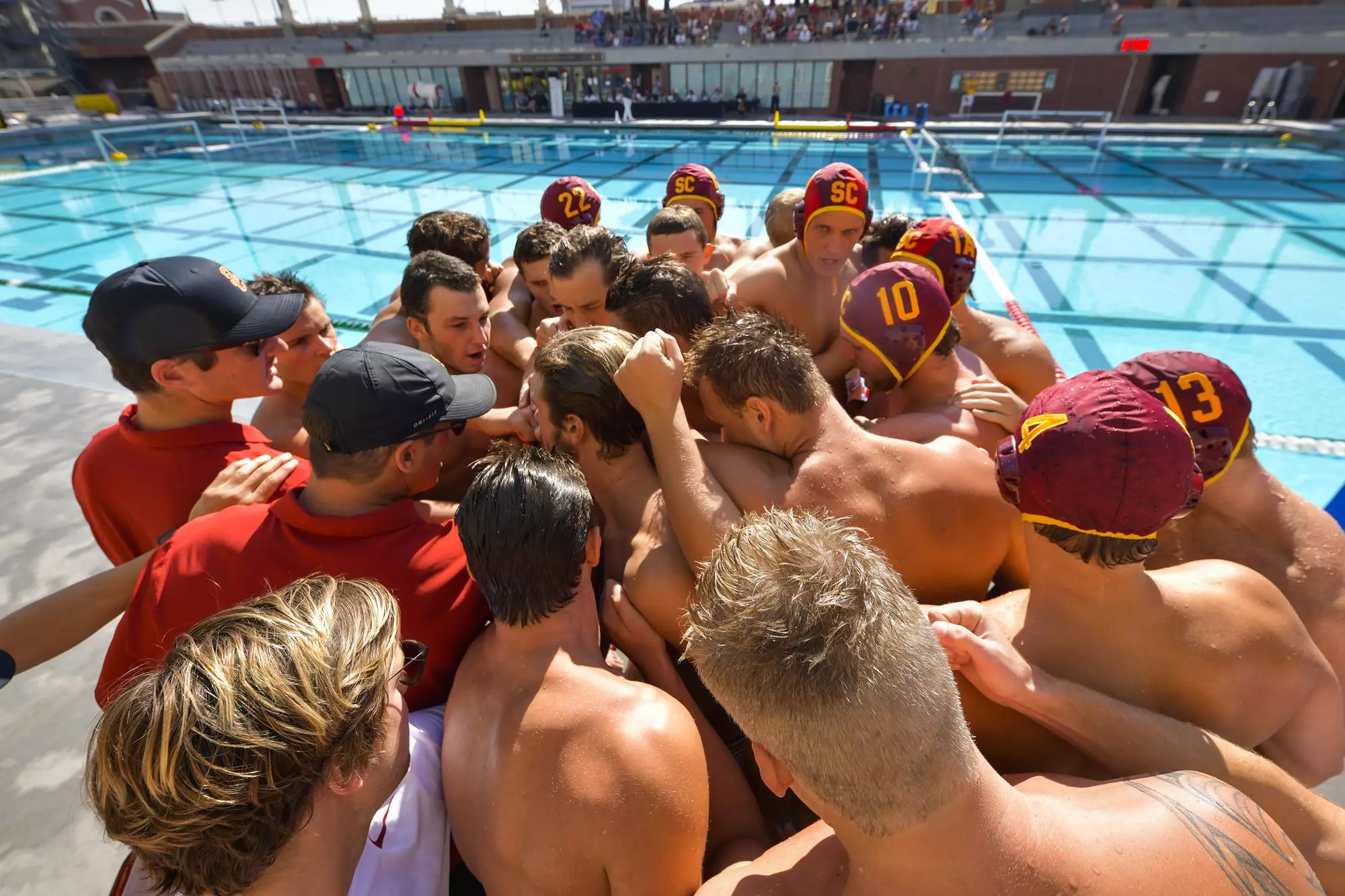 men's water polo team huddling up