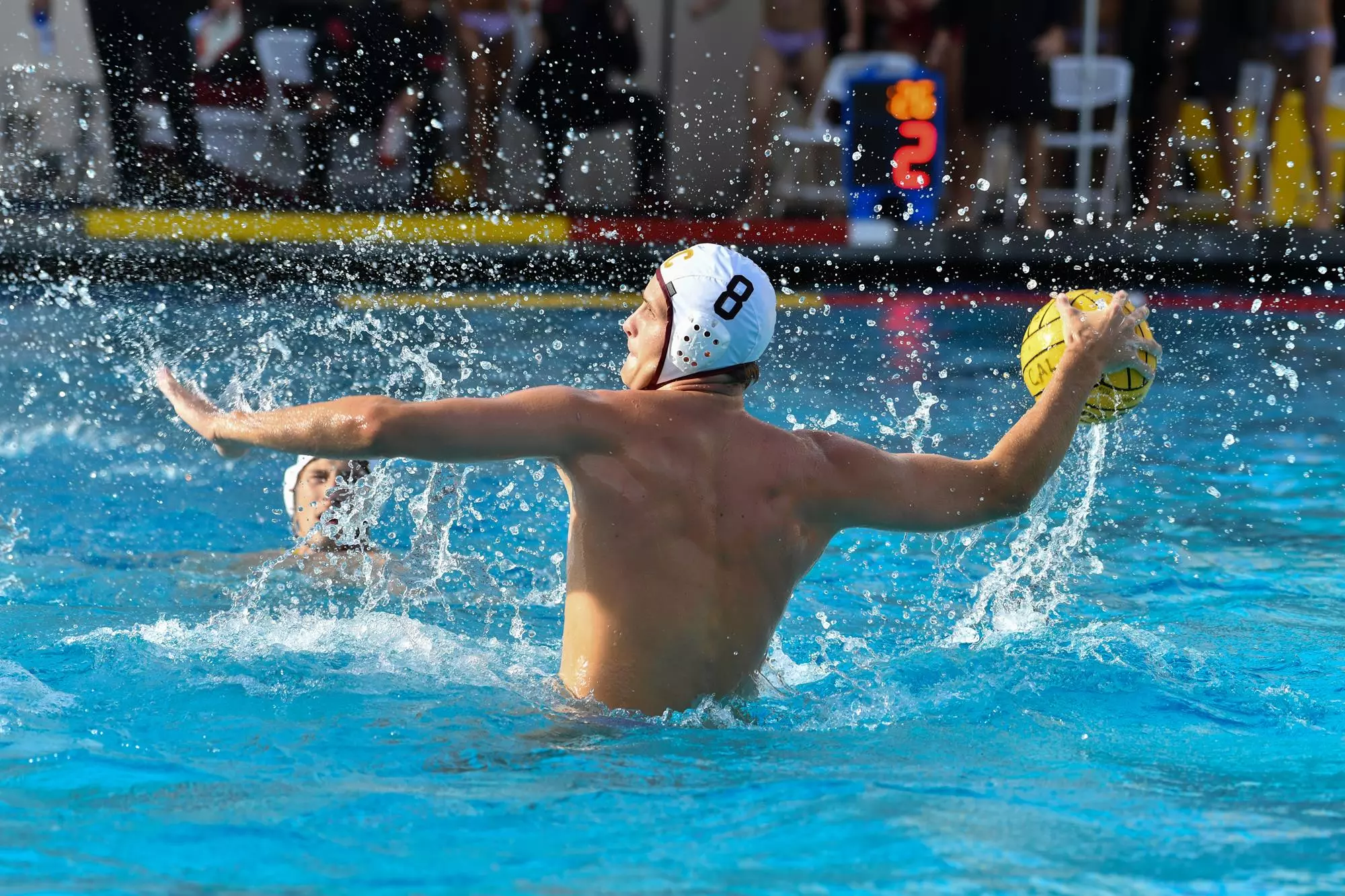 Men's Water Polo player about to throw ball