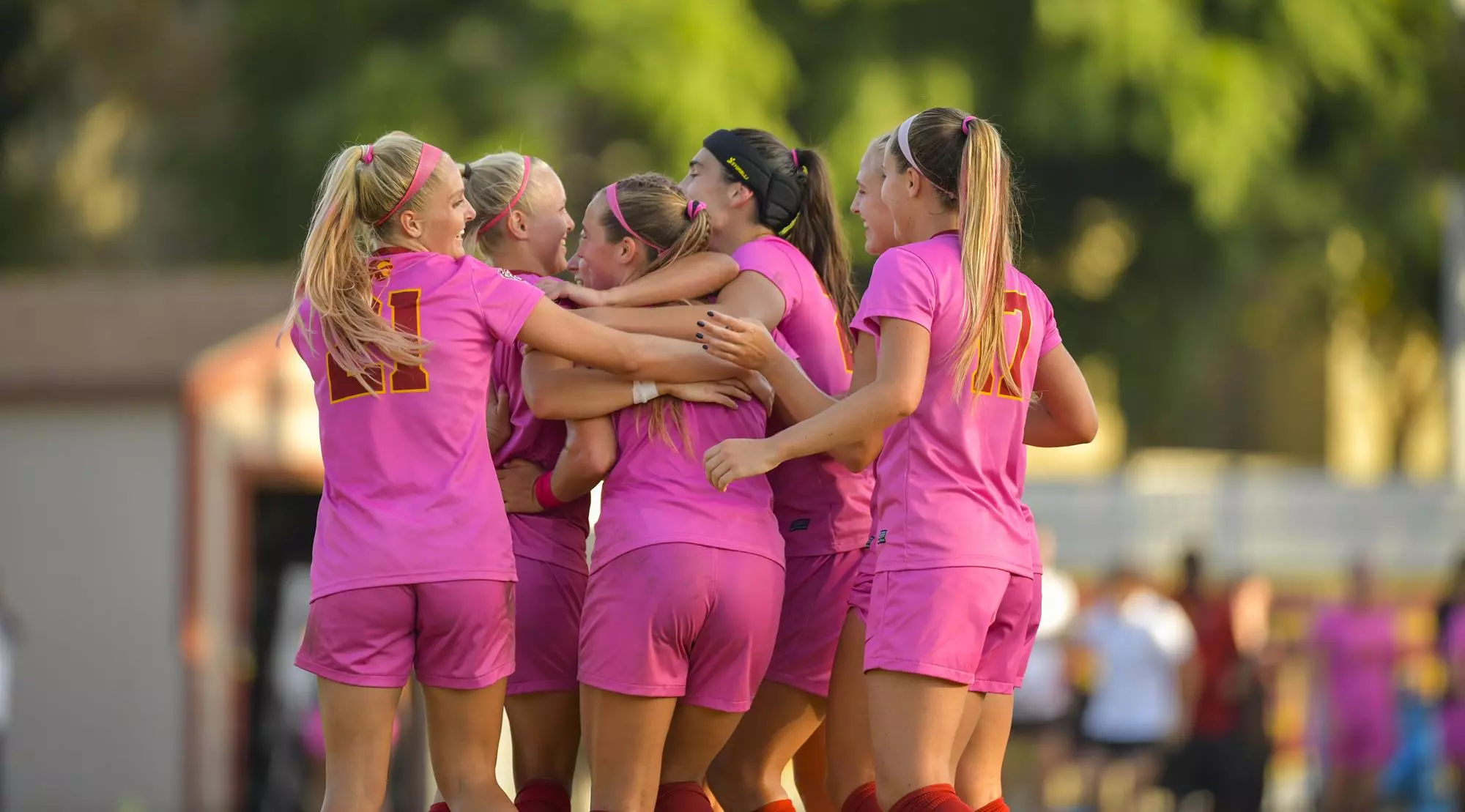 Soccer team huddles
