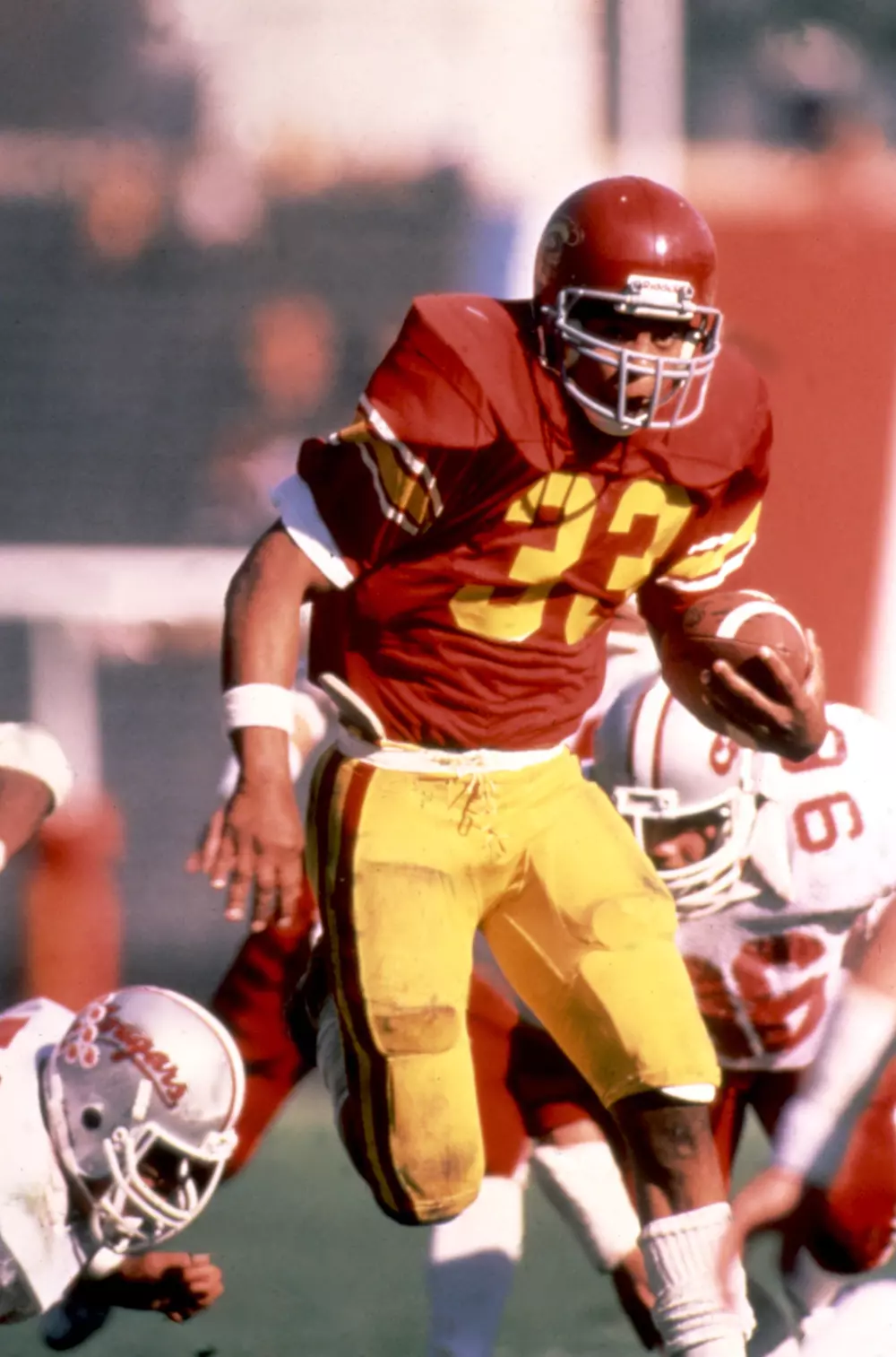 Marcus Allen carrying ball