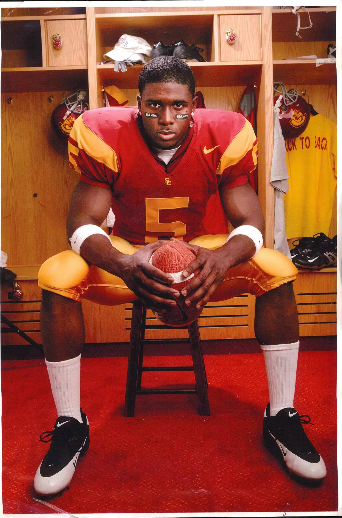 Reggie Bush posing in locker room