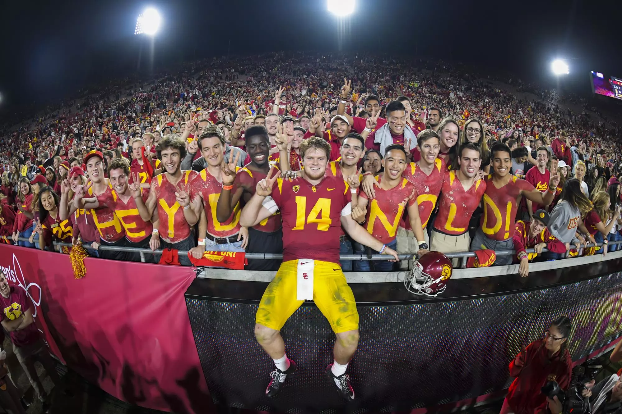 Sam Darnold celebrates with Trojan Knights