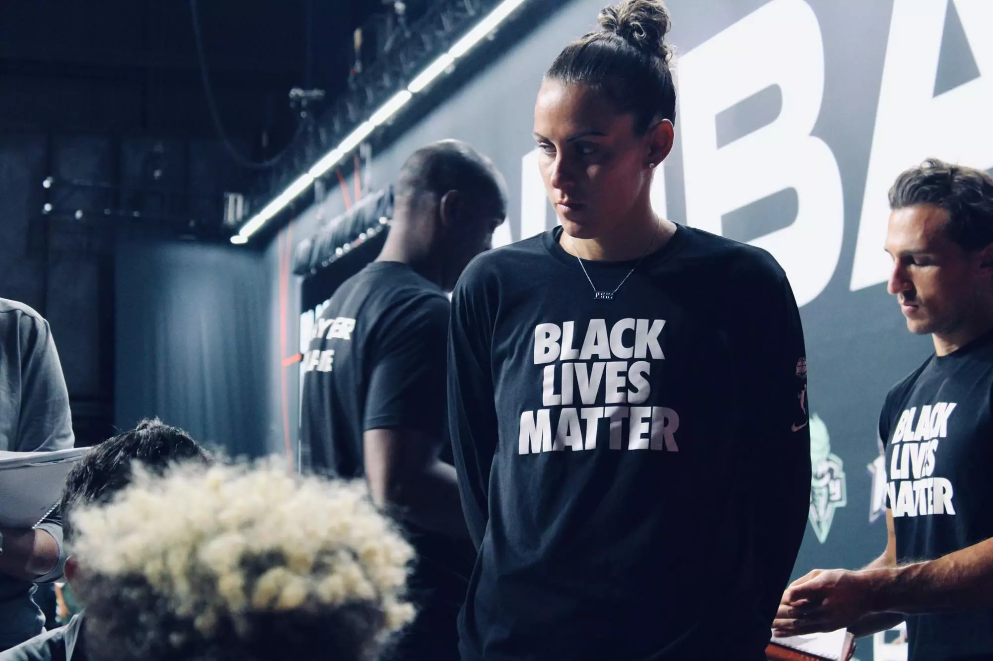 Jacki Gemelos wearing black lives matter shirt