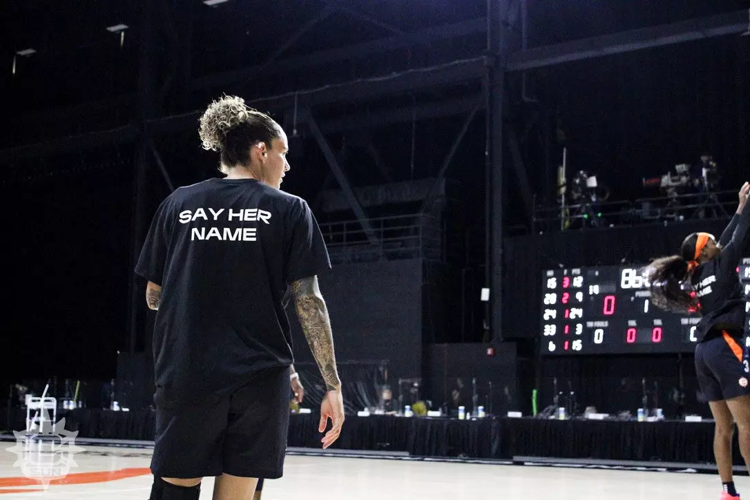 Jacki Gemelos wearing Say Her Name shirt