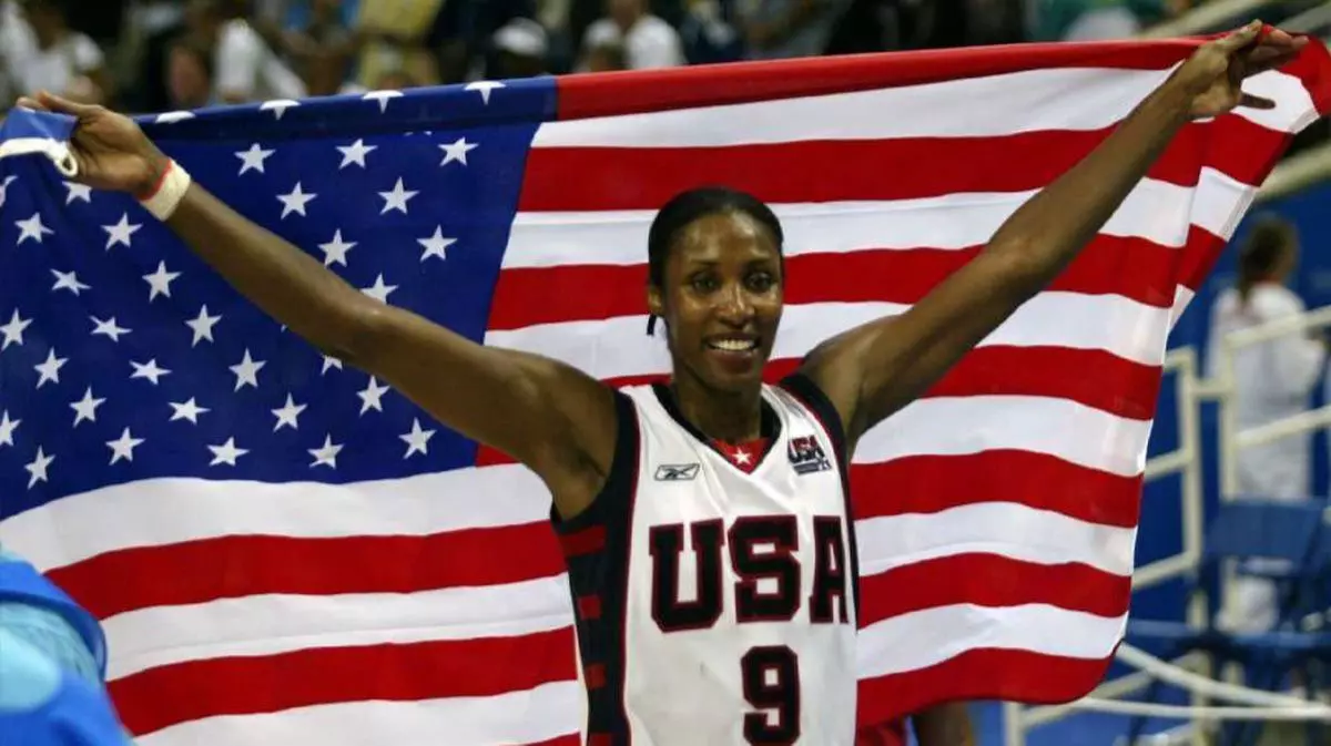 LISA LESLIE WITH US FLAG