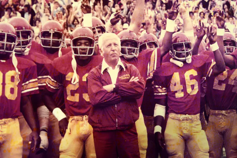 John McKay standign with team