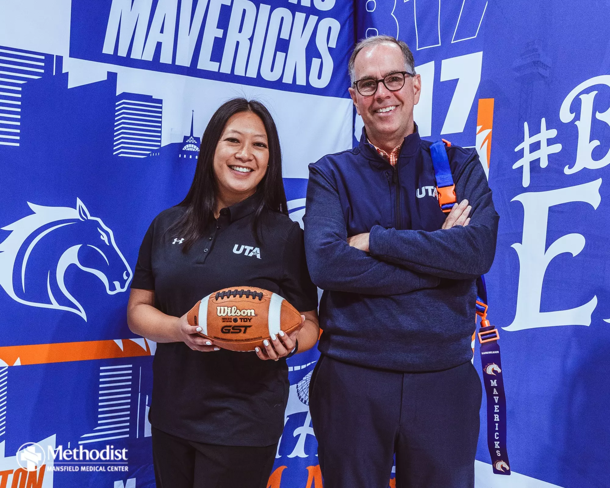 UTA Head Coach Melinda Nguyen and Director of the Division of Intercollegiate Athletics Jon Fagg