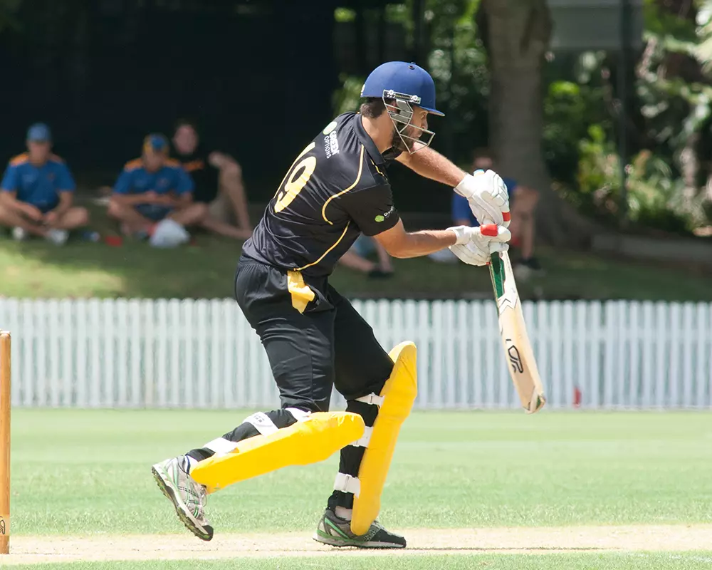 Athlete Competing In Cricket