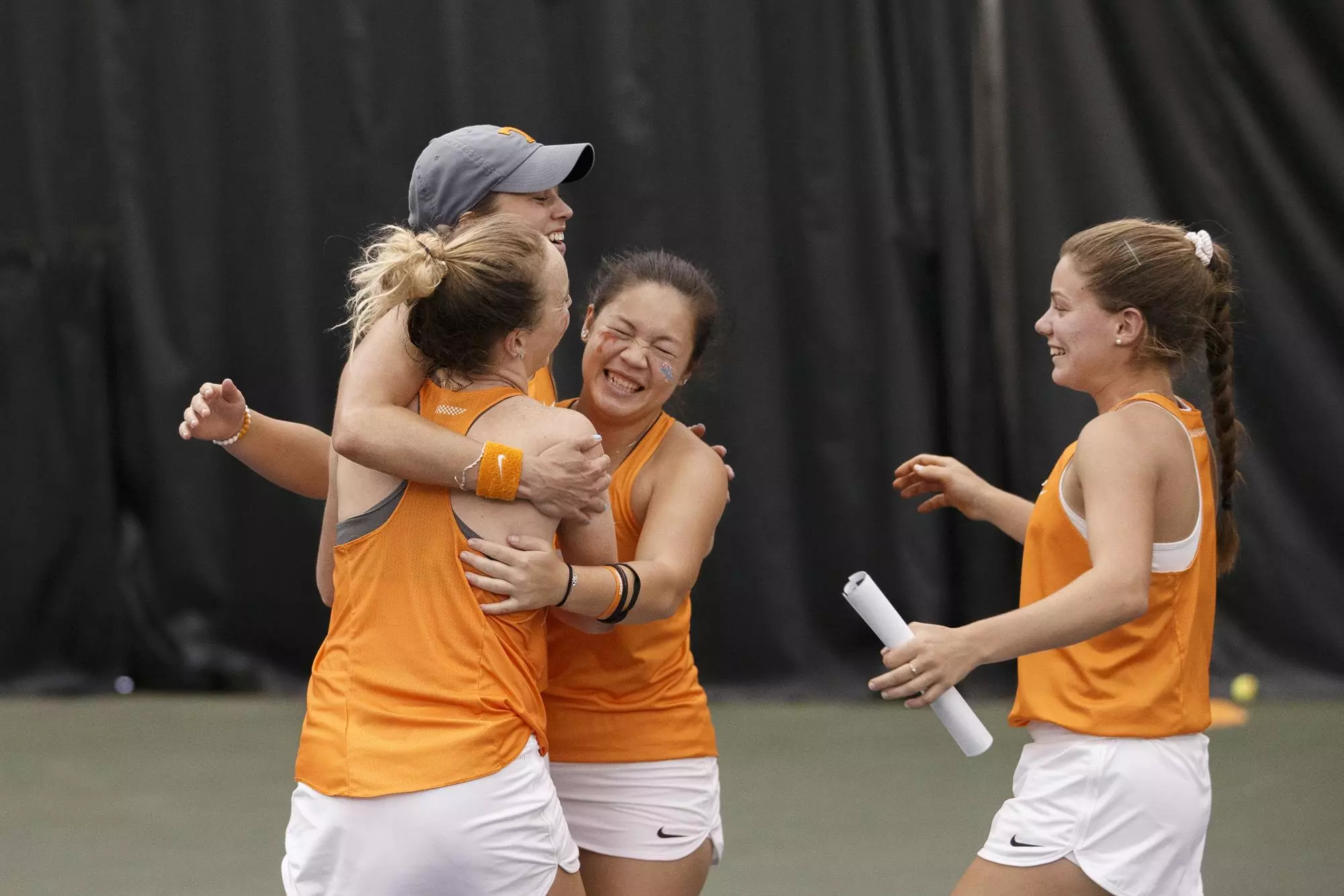 KNOXVILLE, TN - April 14, 2019 - Tenika McGiffin of the Tennessee Volunteers with teammates during the match between the Kentucky Wildcats and the Tennessee Volunteers at Goodfriend Tennis Center in Knoxville, TN. Photo By Megan Albers\UT Athletics