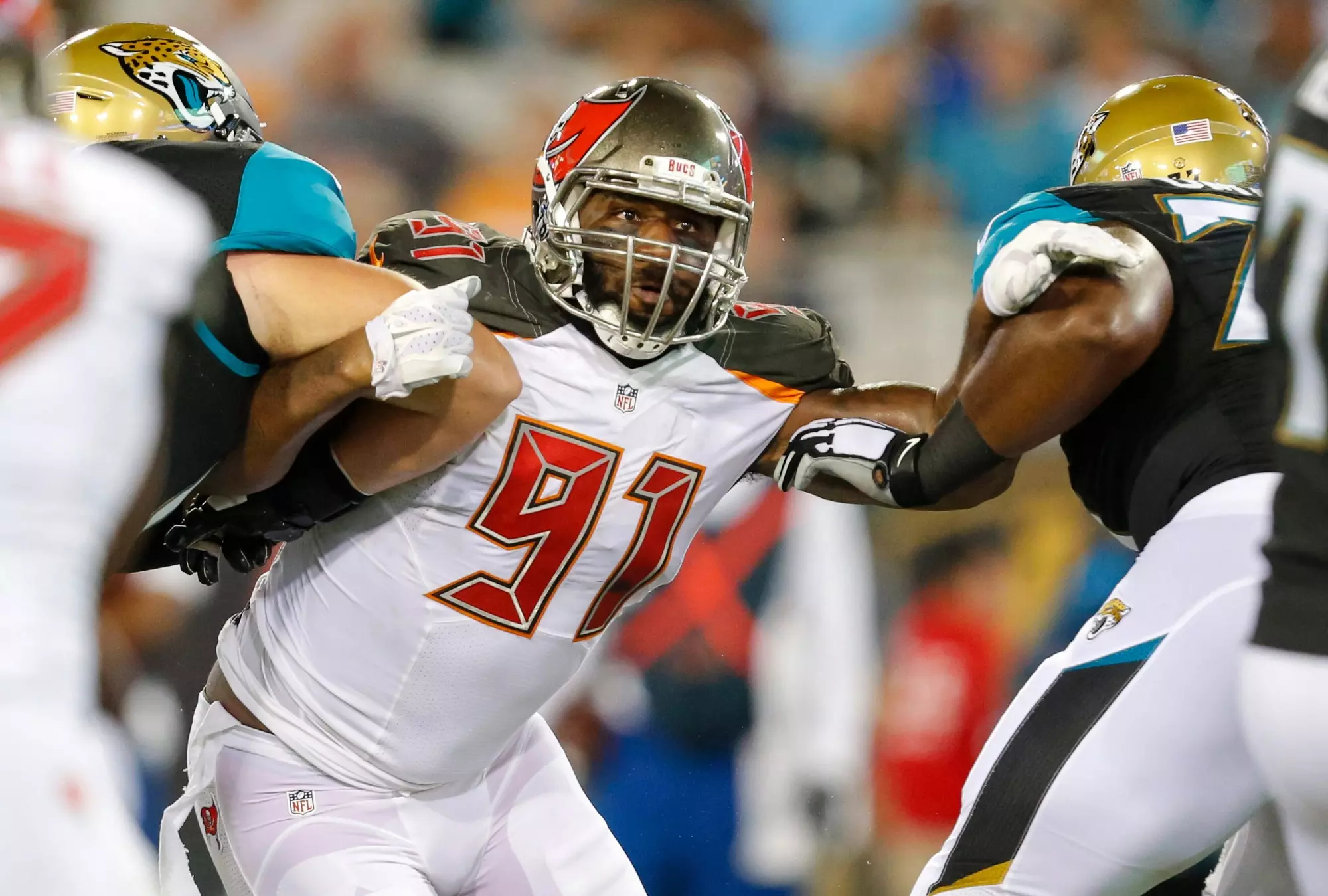 JACKSONVILLE, FL - AUGUST 20: Defensive End Robert Ayers #91 of the Tampa Bay Buccaneers during the game against the Jacksonville Jaguars at EverBank Field on August 20, 2016, in Jacksonville, Florida. The Buccaneers won 27-21. (photo by Mike Carlson/Tampa Bay Buccaneers)