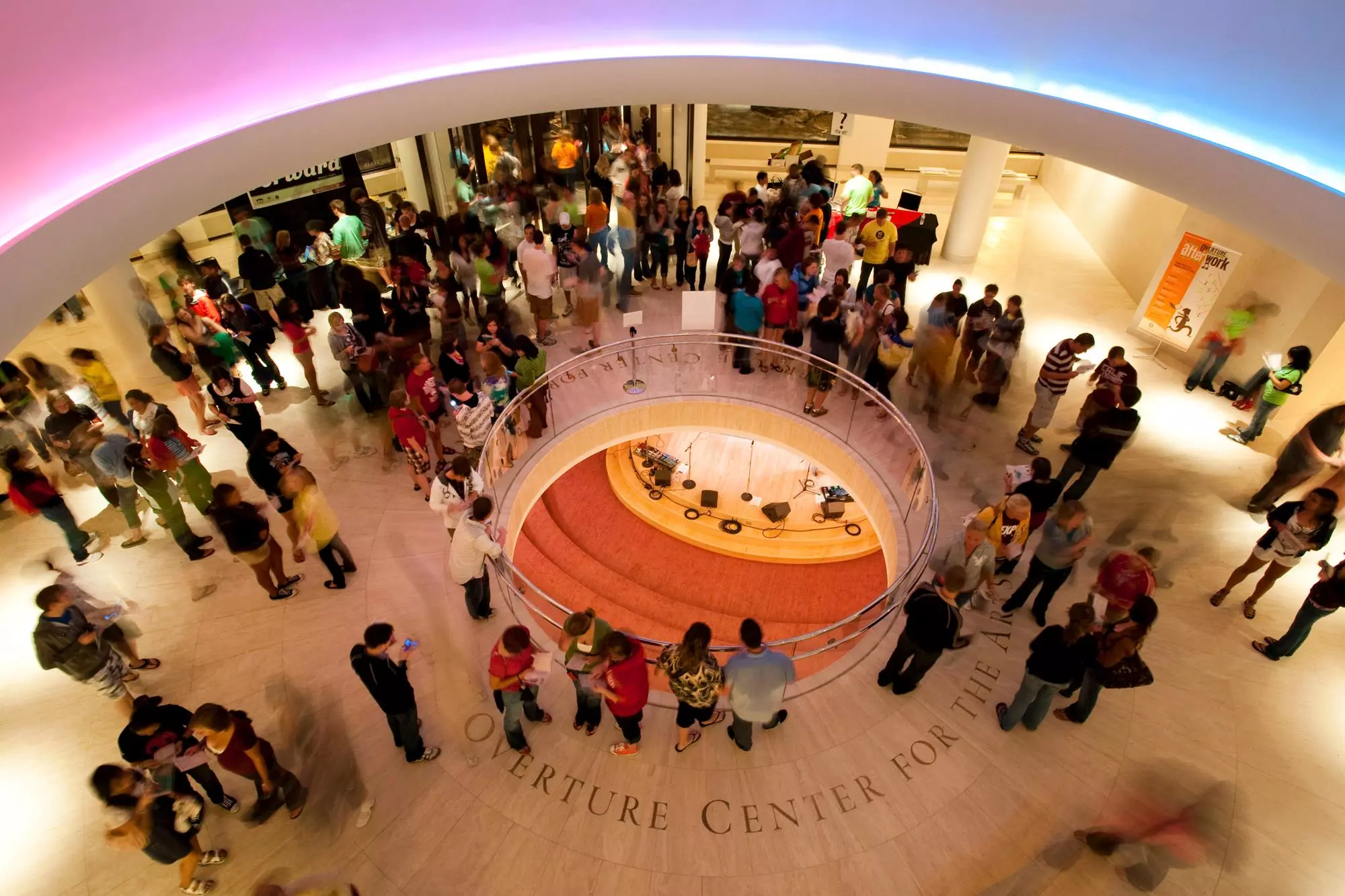 During a Wisconsin Welcome event dubbed First Night at the Overture, University of Wisconsin-Madison students enter the foyer of the Overture Center for the Arts in downtown Madison on Aug. 28, 2009. Throughout the evening, more than 3,000 freshmen and transfer students filled multiple spaces at Overture and enjoyed a variety of arts, comedy, dance and music performances, plus socializing with new friends.©UW-Madison University Communications 608/262-0067Photo by: Jeff MillerDate:  08/09    File#:  NIKON D3 digital frame 8293