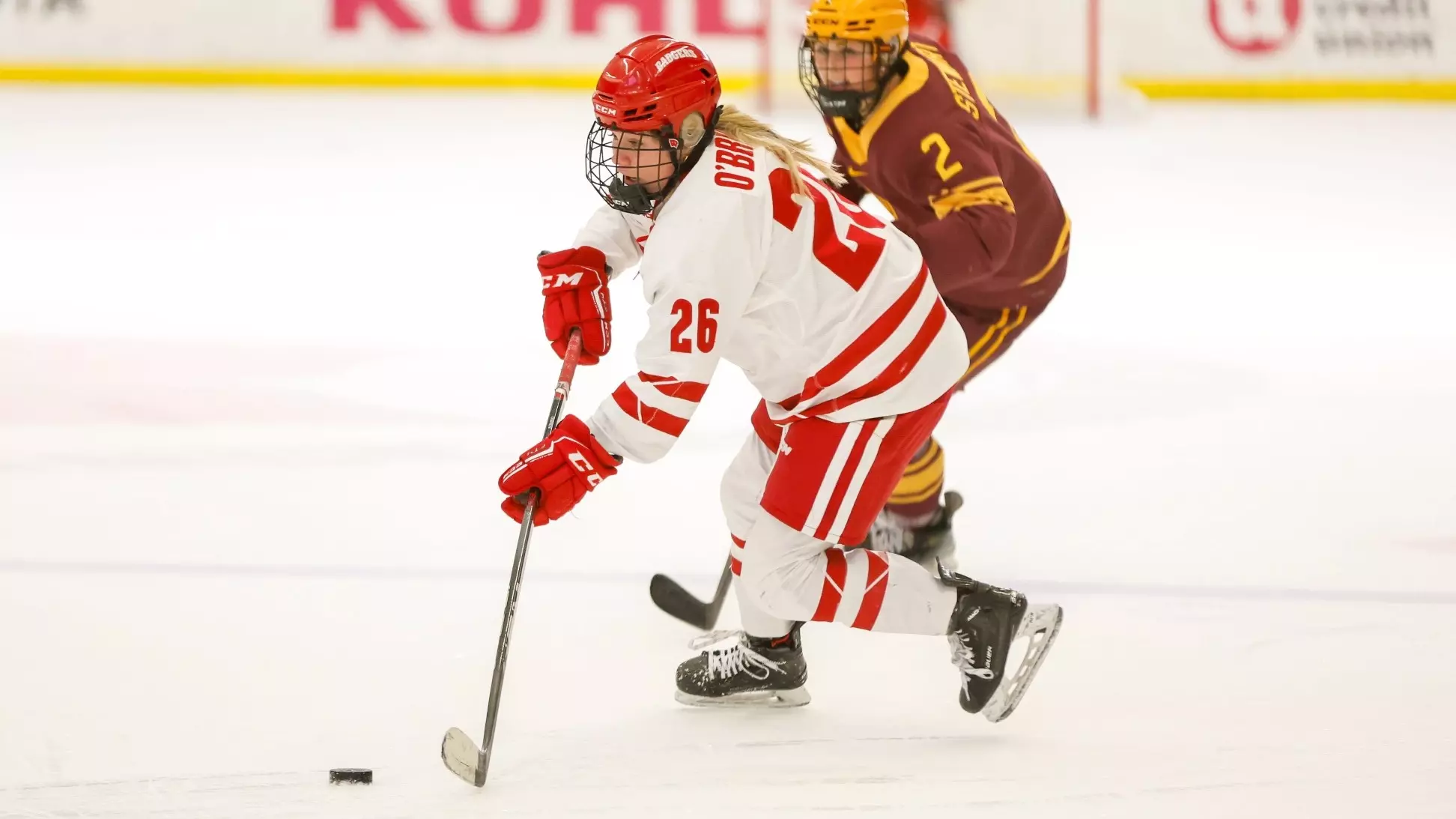 Casey O'Brien handles a puck against Minnesota