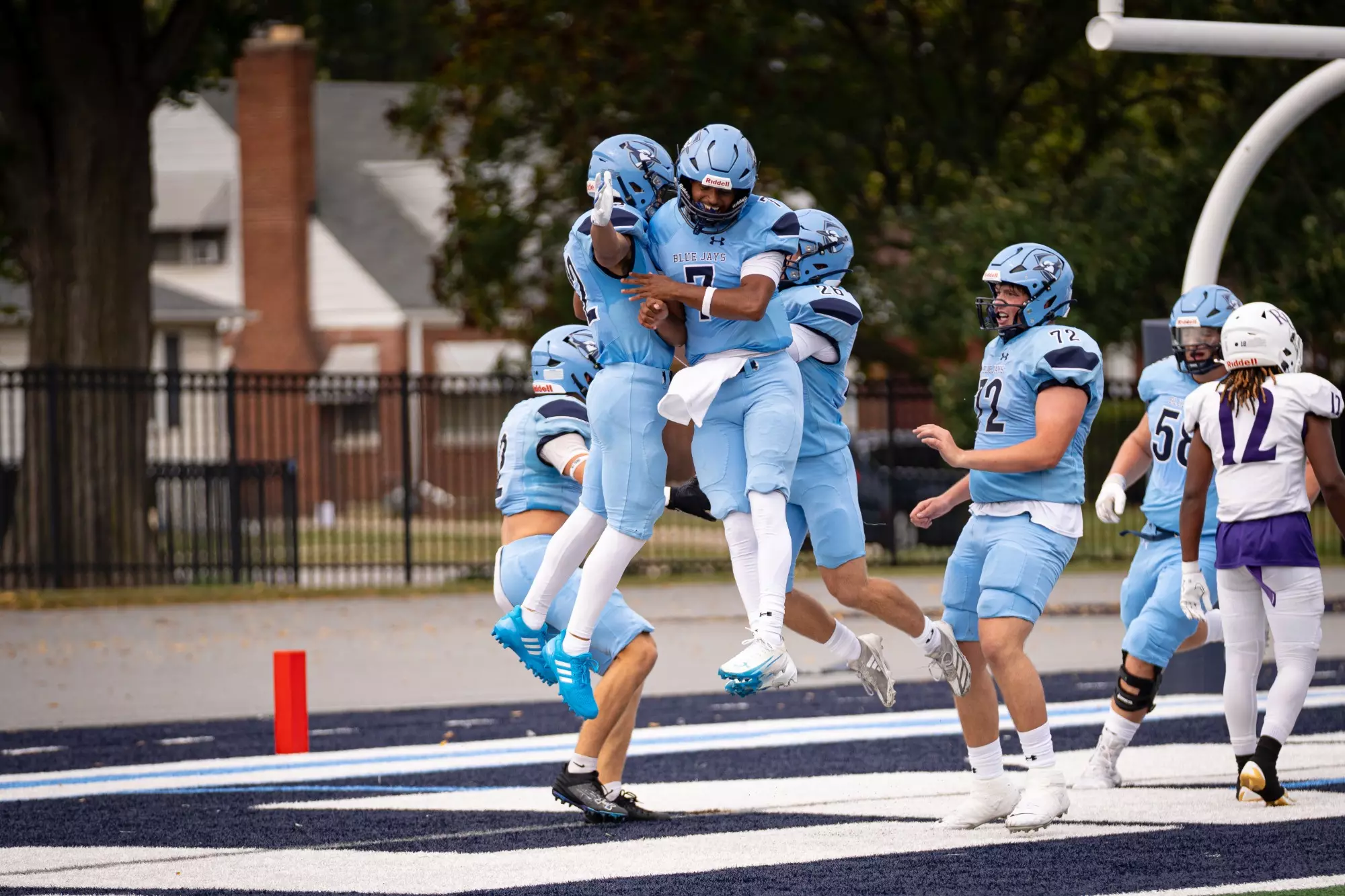 Elmhurst Rocks Elmhurst Shows Fight in Road Battle at Carroll - Elmhurst University ...