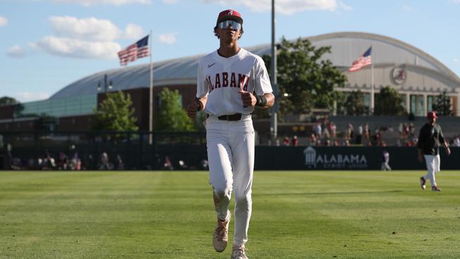 Alabama baseball player Justin Lebron (1) warms up at Sewell Thomas Stadium in Tuscaloosa, AL on Friday, May 10, 2024.
