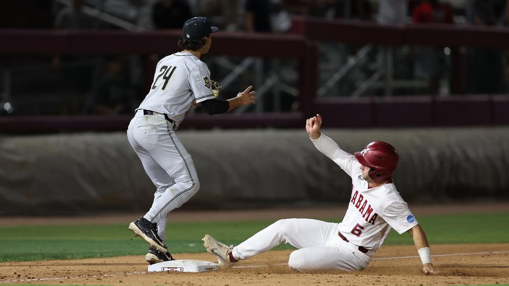 Alabama baseball player Max Grant (6) slides into third base against UCF at Mike Martin Field at Dick Howser Stadium in Tallahassee, FL on Friday, May 31, 2024.
