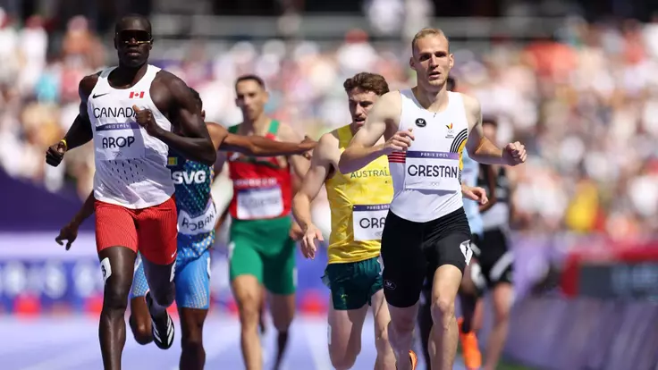 PARIS, FRANCE - AUGUST 07: Marco Arop of Team Canada and Eliott Crestan of Team Belgium compete during the Men's 800m Round 1 on day twelve of the Olympic Games Paris 2024 at Stade de France on August 07, 2024 in Paris, France. (Photo by Hannah Peters/Getty Images)