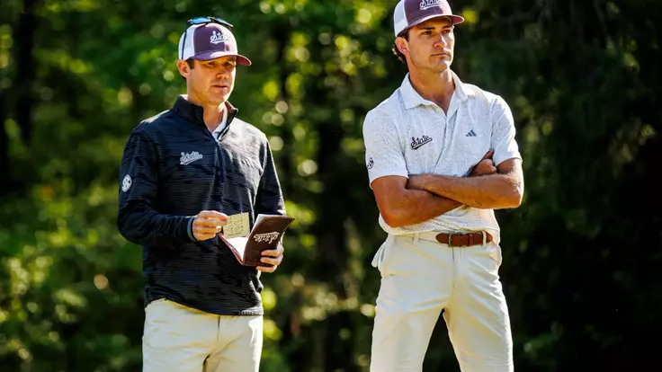 WEST POINT, MS - April 14, 2025 - Mississippi State Head Coach Dusty Smith and Mississippi State's Drew Wilson during the Old Waverly Collegiate Championship at Old Waverly Golf Club in West Point, MS. Photo By Mike Mattina
