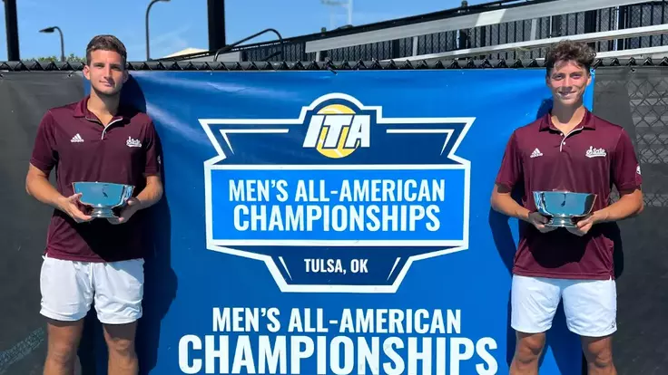 Petar Jovanovic and Benito Sanchez Martinez Pose with their ITA All-American Doubles Championship Trophy
