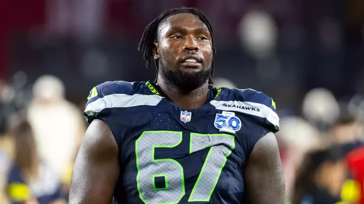 Sep 25, 2025; Glendale, Arizona, USA; Seattle Seahawks tackle Charles Cross (67) against the Arizona Cardinals at State Farm Stadium. Mandatory Credit: Mark J. Rebilas-Imagn Images