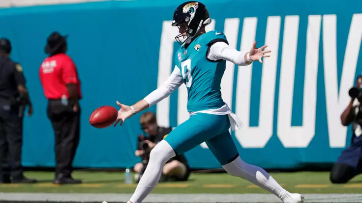 Oct 12, 2025; Jacksonville, Florida, USA; Jacksonville Jaguars punter Logan Cooke (9) punts during the first half against the Seattle Seahawks at EverBank Stadium. Mandatory Credit: Travis Register-Imagn Images