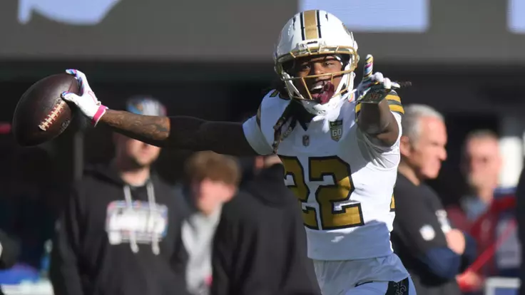 Oct 18, 2026; East Rutherford, New Jersey, USA; New Orleans Saints cornerback Martin Emerson Jr. (22) celebrates with defensive end Cameron Jordan (94) after intercepting a pass intended for New York Giants wide receiver Malik Nabers (not pictured) during the third quarter at MetLife Stadium. Mandatory Credit: John Jones-Imagn Images