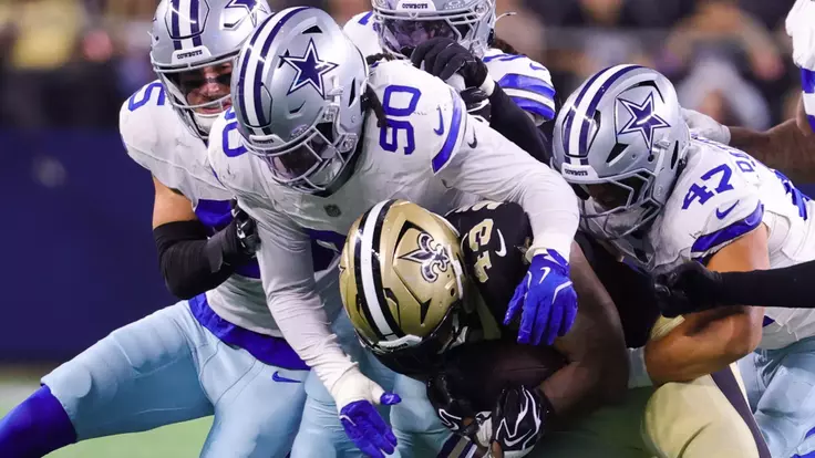 Aug 28, 2026; Arlington, Texas, USA; Dallas Cowboys linebacker Tyrus Wheat (90) tackles New Orleans Saints running back CJ Donaldson (43) during the game at AT&T Stadium. Mandatory Credit: Kevin Jairaj-Imagn Images
