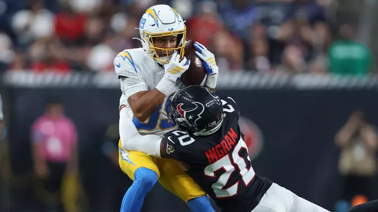 Aug 13, 2026; Houston, Texas, USA; Los Angeles Chargers wide receiver Brenen Thompson (89) makes a reception as Houston Texans cornerback Ja'Marcus Ingram (20) defends during the second quarter at Reliant Stadium. Mandatory Credit: Troy Taormina-Imagn Images